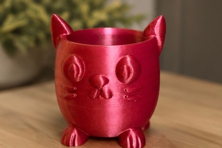 Red cat shaped decorative planter pot