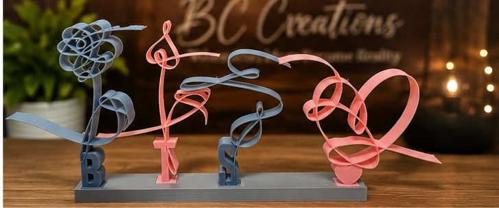 Metal wire art sculpture spelling LOVE