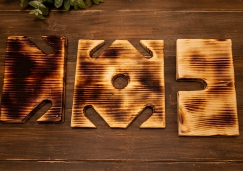 Wooden trivets with burn marks